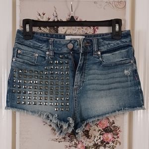 Studded cut-off shorts